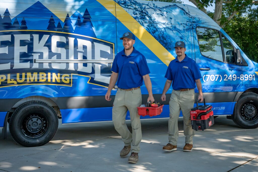 Team members walking Creekside Plumbing